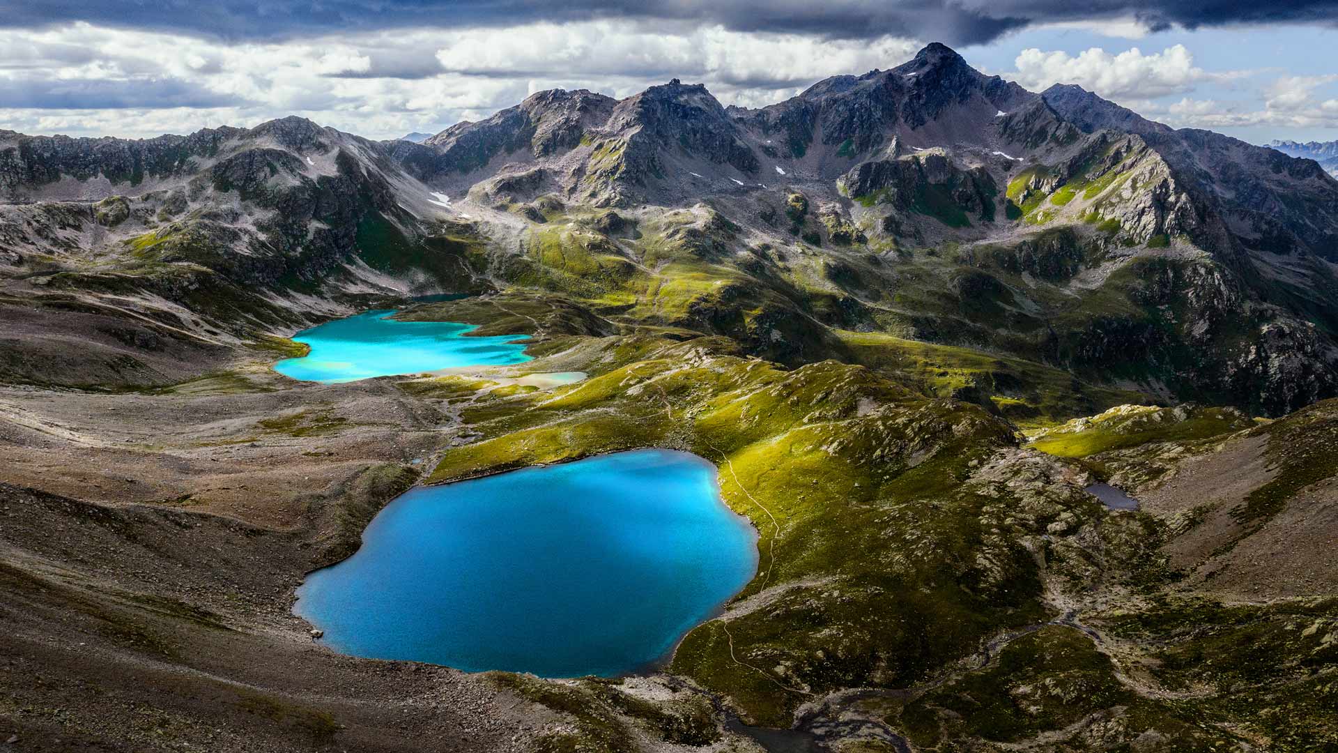 蓝湖和险峰|阿尔卑斯山脉锡尔夫雷塔山的乔里森湖，瑞士 |© Florin Baumann/Getty Images